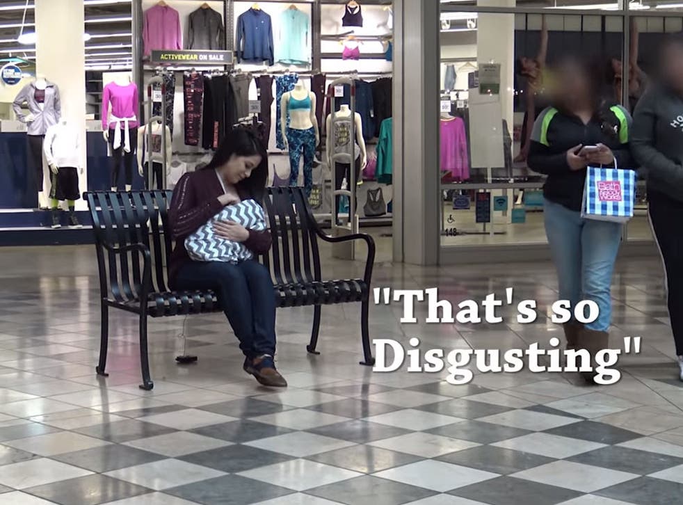 A passer-by comments loudly on a woman breastfeeding in public