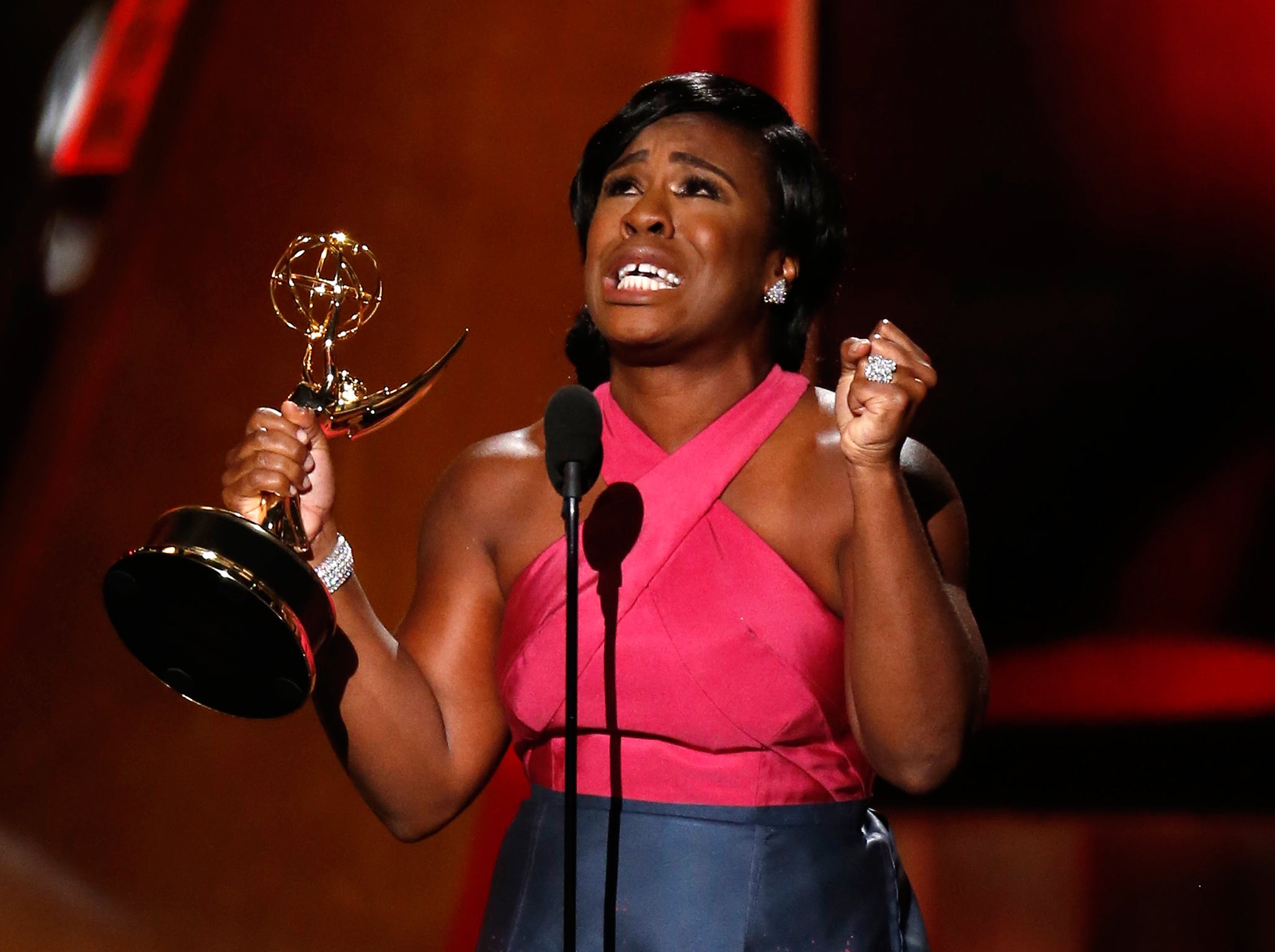 Uzo Aduba accepts the award for Outstanding Supporting Actress In A Drama Series for her role in Netflix's "Orange is the New Black" at the 67th Primetime Emmy Awards in Los Angeles, California September 20, 2015