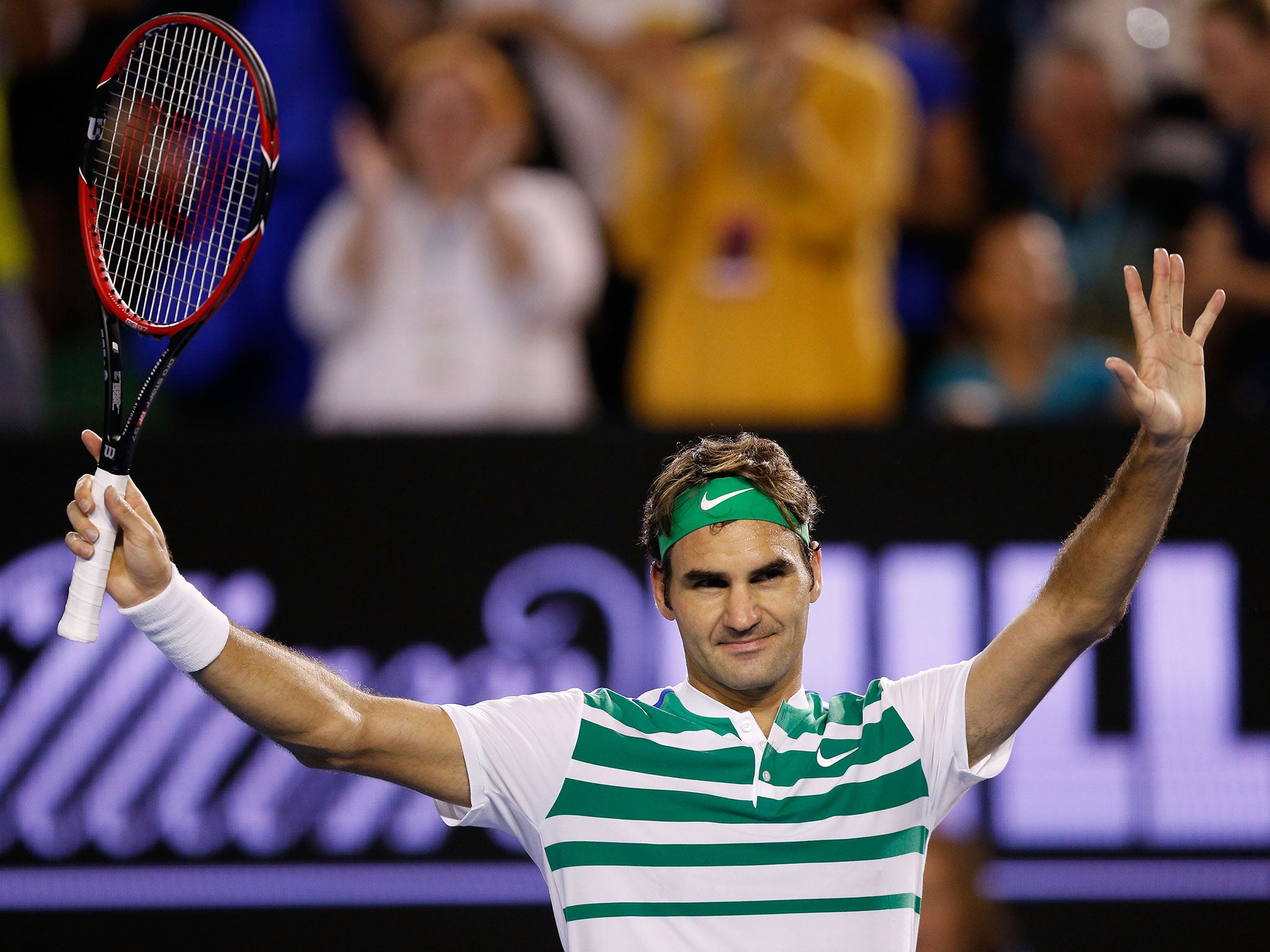 Roger Federer celebrates his victory over Grigor Dimitrov