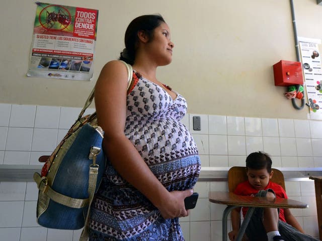 A pregnant woman waits to be see if she has Zika at a hospital in Honduras 
