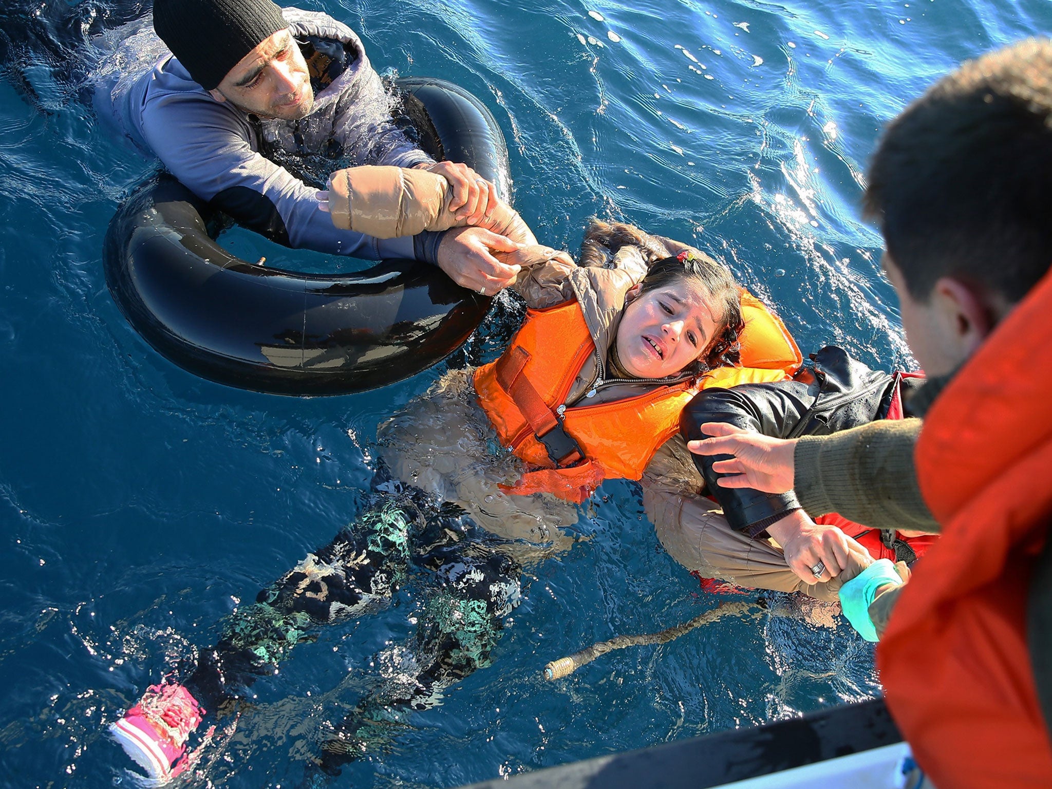 Turkish Coast Guard rescue refugees after their boats capsized