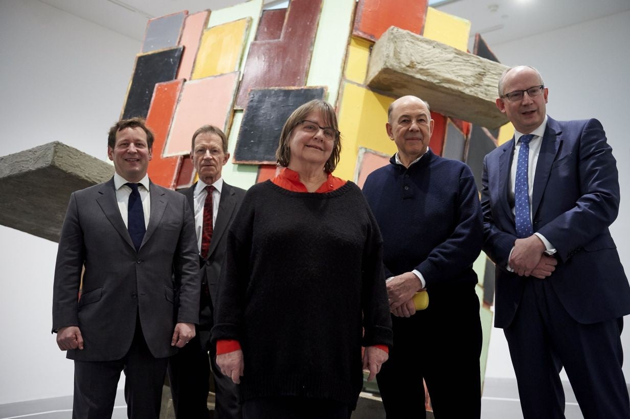 Minister of State at the Department for Culture, Media and Sport, Ed Vaizey, director of the Tate art museums and galleries, Nicholas Serota, Phyllida Barlow, Anthony dOffay and Director National Galleries of Scotland, John Leighton pose in front of a sculpture "untitled: upturnedhouse 2"