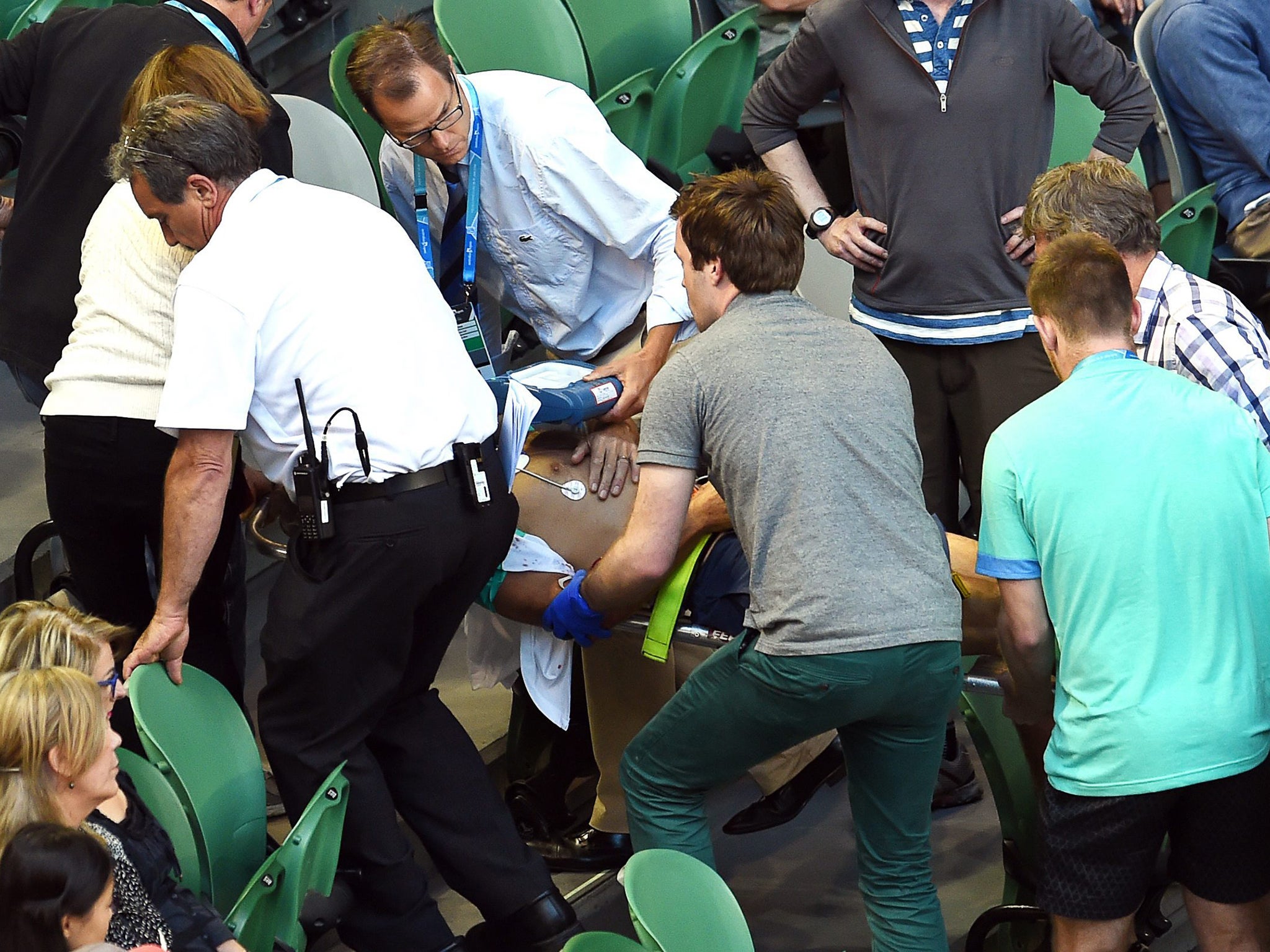 Nigel Sears is treated by medics after his collapse