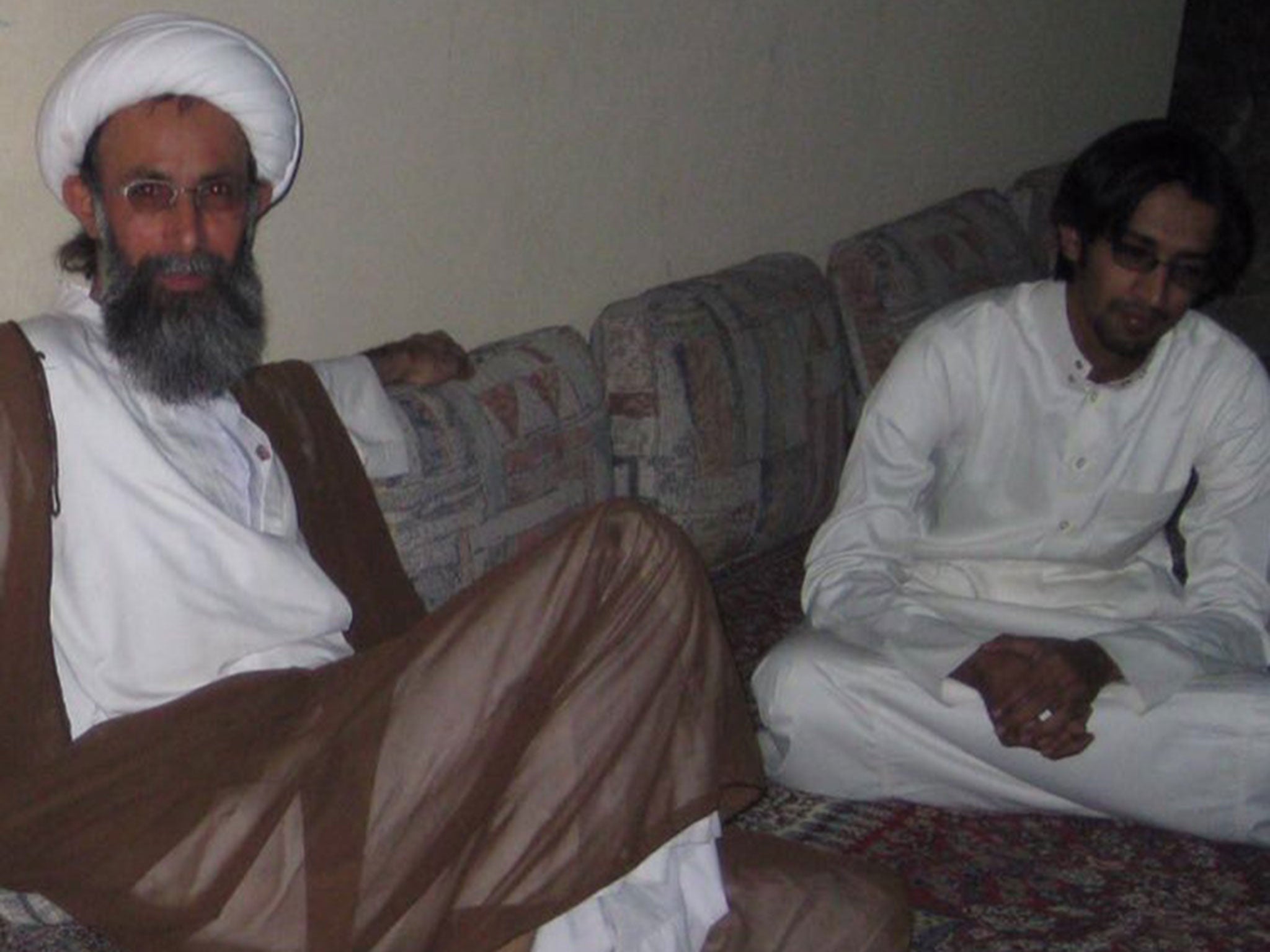 Sheikh al-Nimr with his son