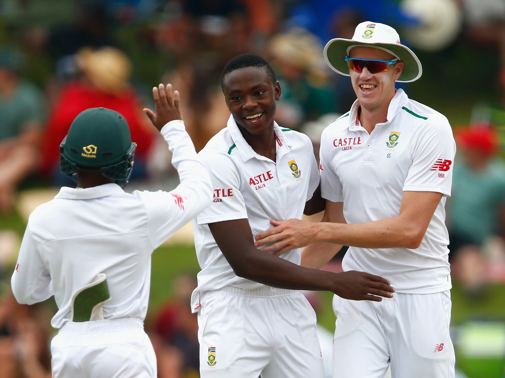 Kagiso Rabada is congratulated by Morne Morkel after he took the wicket of Jonny Bairstow
