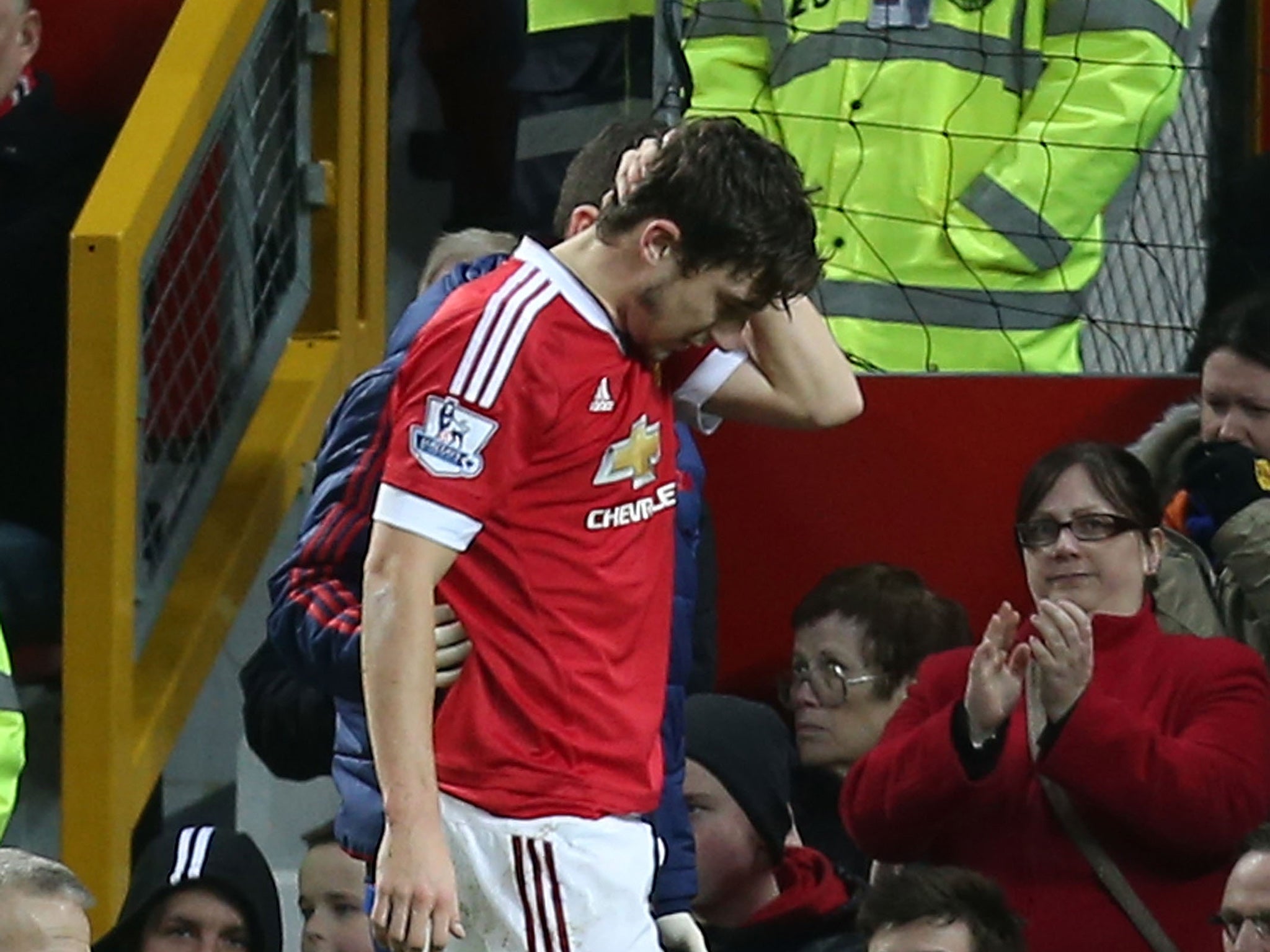 Matteo Darmian is clapped off after suffering injury against Southampton