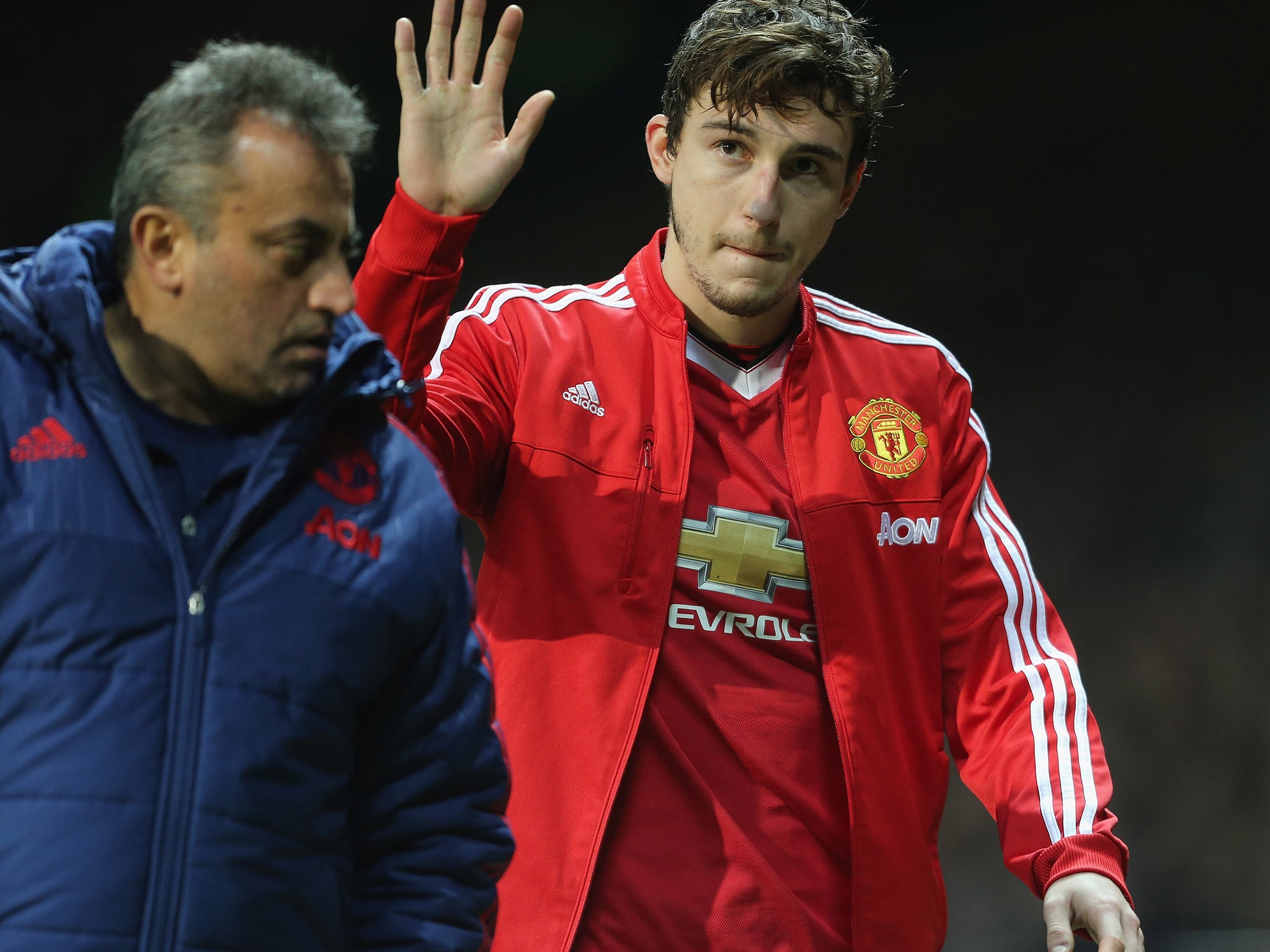 &#13;
Darmian was able to wave to the fans as he left the pitch&#13;