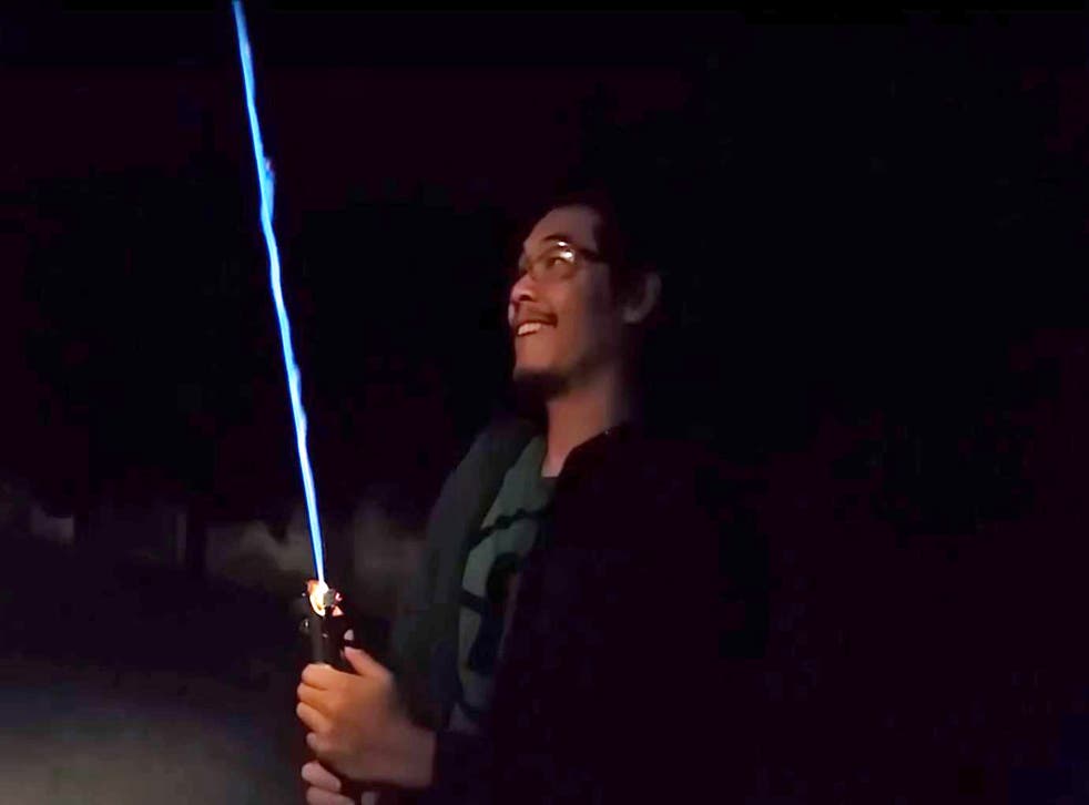Allen Pan with his homemade lightsaber