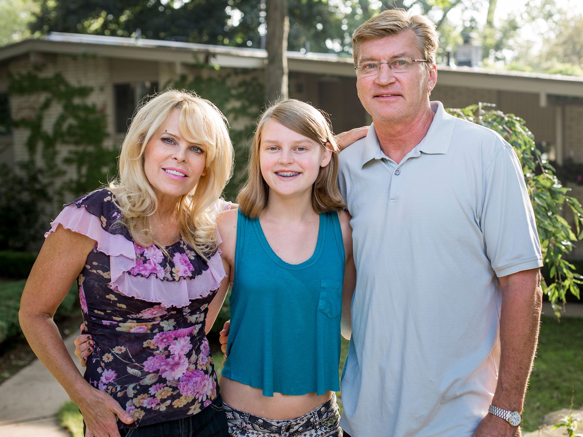 Alana Saarinen, 15, with her parents Sharon and Paul, was conceived by IVF using genetic material from three individuals