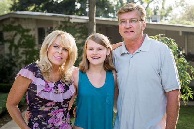 Alana Saarinen, 15, with her parents Sharon and Paul, was conceived by IVF using genetic material from three individuals