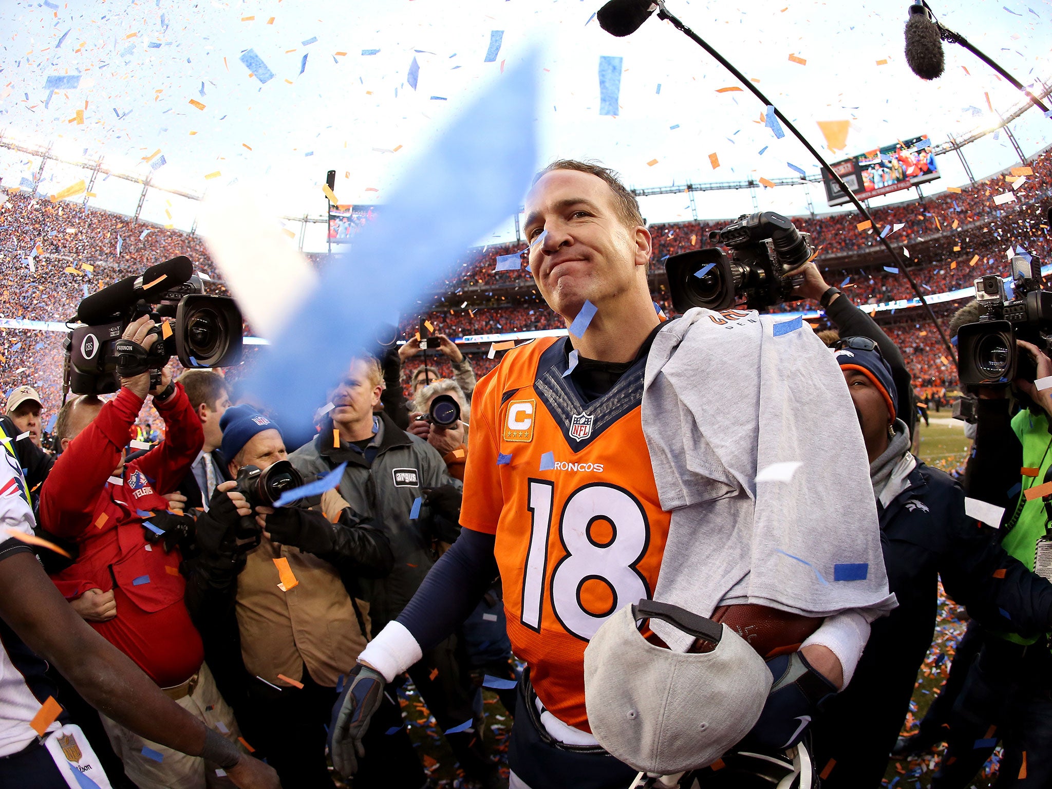 Peyton Manning of the Denver Broncos celebrates after defeating the New England Patriots in the AFC Championship game
