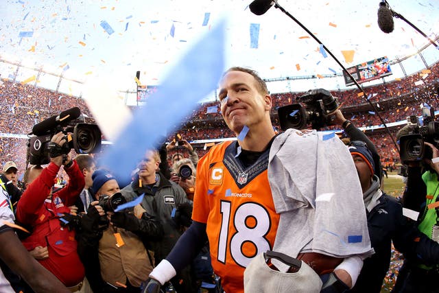Peyton Manning of the Denver Broncos celebrates after defeating the New England Patriots in the AFC Championship game