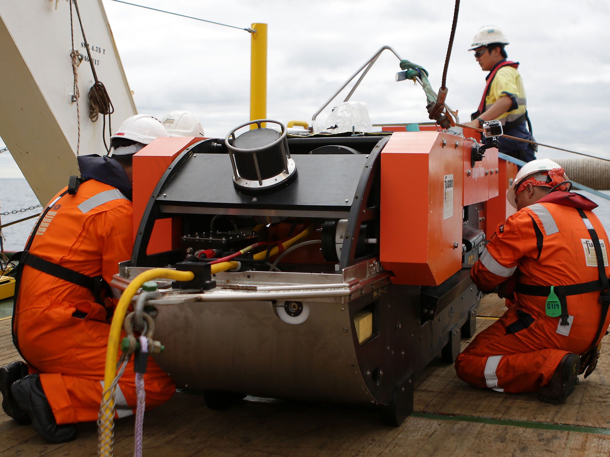 The towfish maps the seafloor using sonar