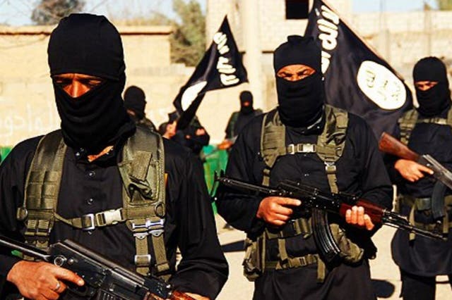 Isis militants in Raqqa