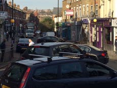 Car crashes into shop in London's Crouch End after police chase