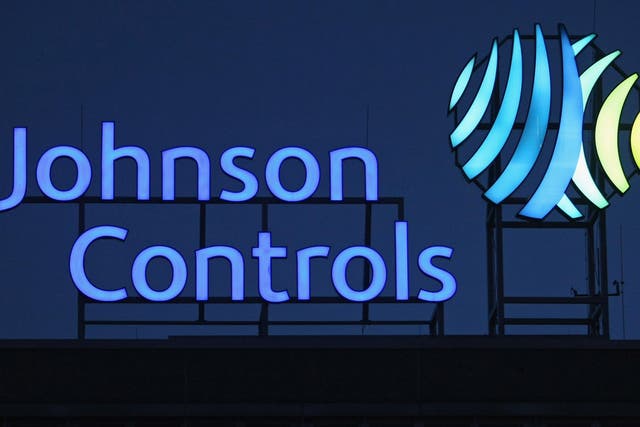 The logo of Johnson Controls stands over its production plant on March 1, 2009 in Hanover, Germany. The U.S. company manufactures car interiors, electic batteries and energy efficiency systems for buildings.