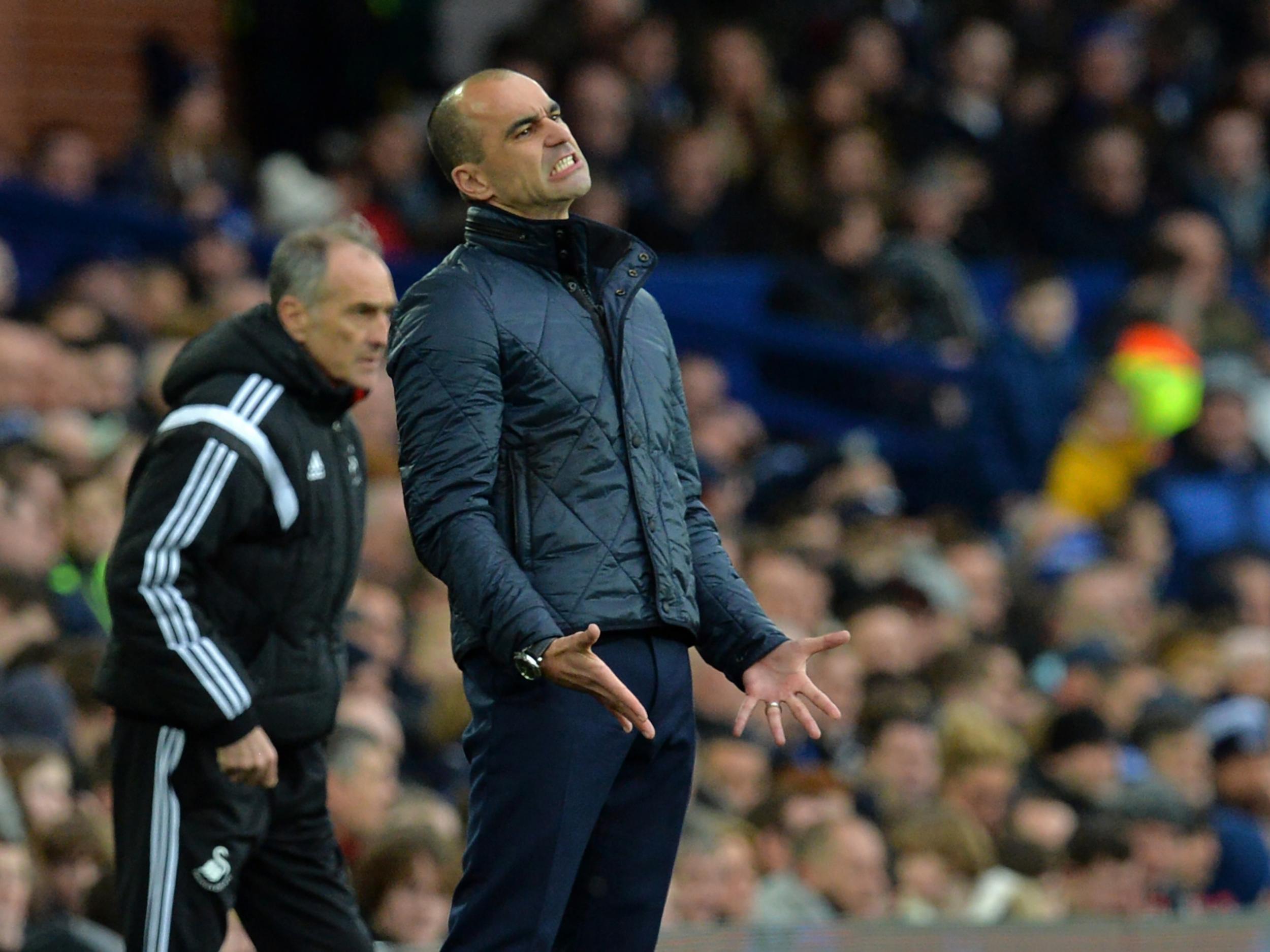 Roberto Martinez watches on with anguish