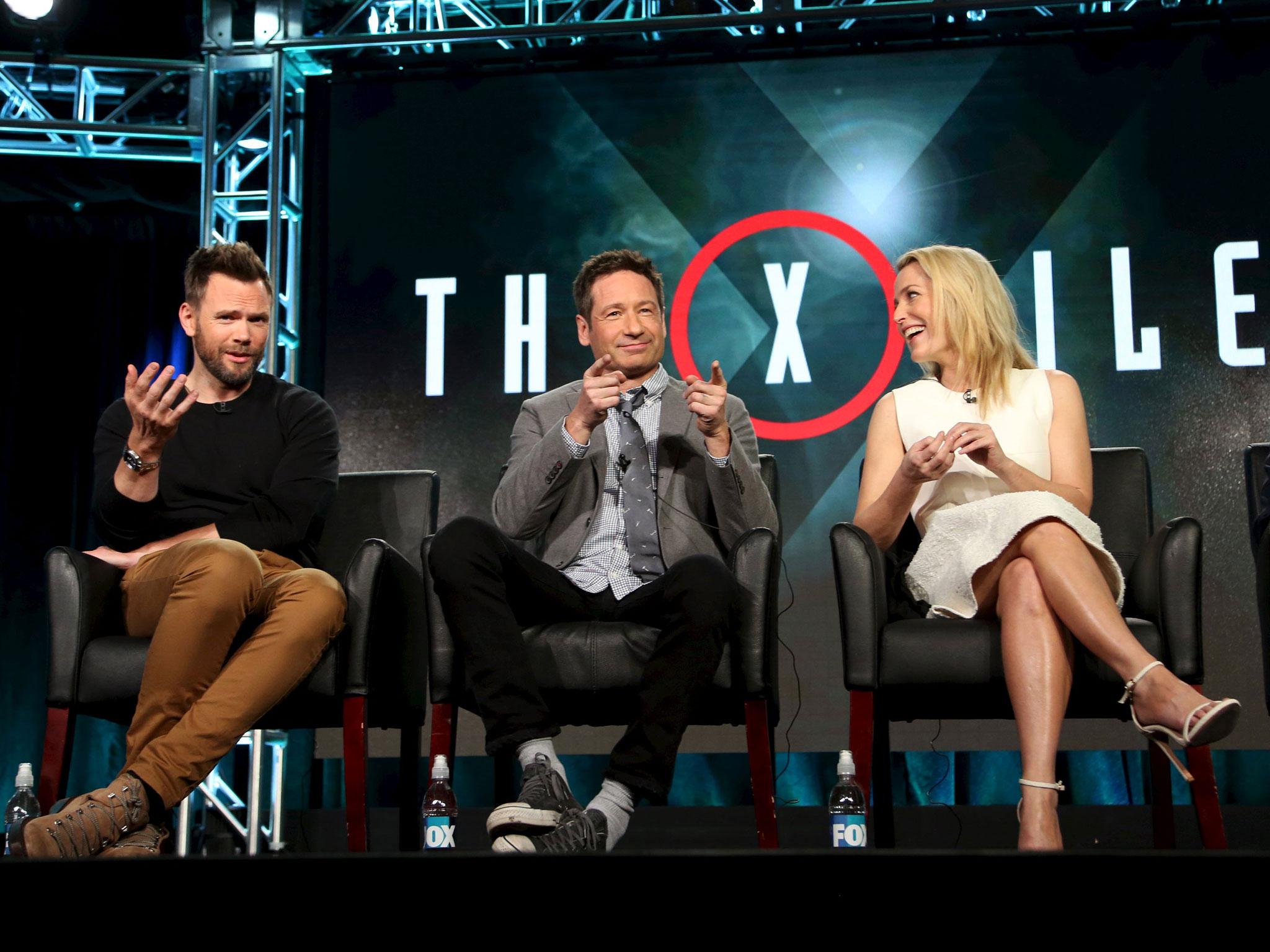 The relationship between David Duchovny (C) and Gillian Anderson's (R) characters formed the show's basis
