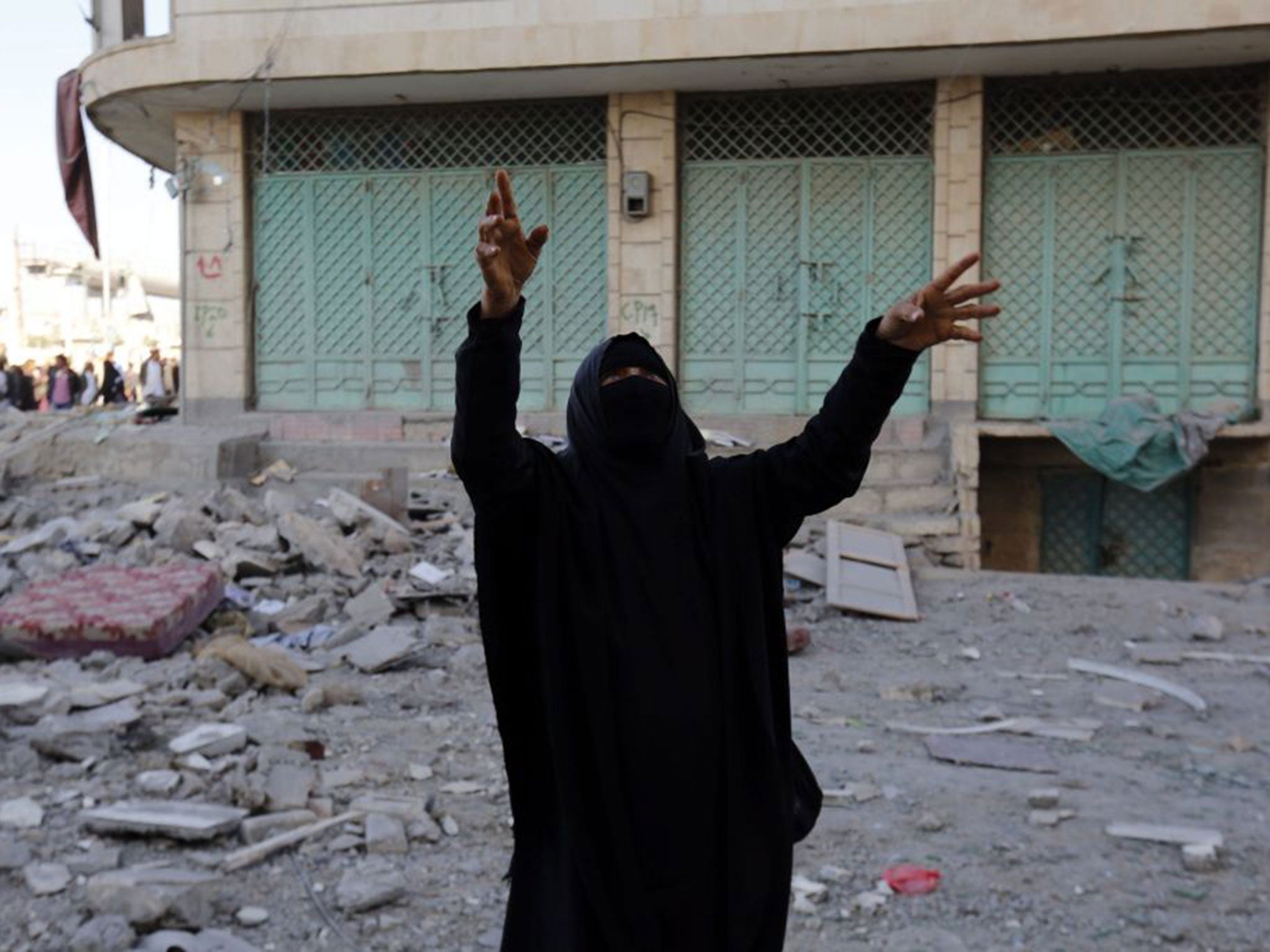 A woman mourning after a bombing in Sanaa. Médecins Sans Frontières staff say that many people are too afraid to accept hospital care for fear of being bombed or targeted