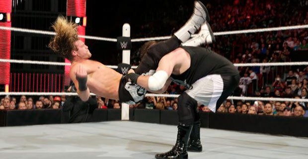Kevin Owens powerbombs Dolph Ziggler