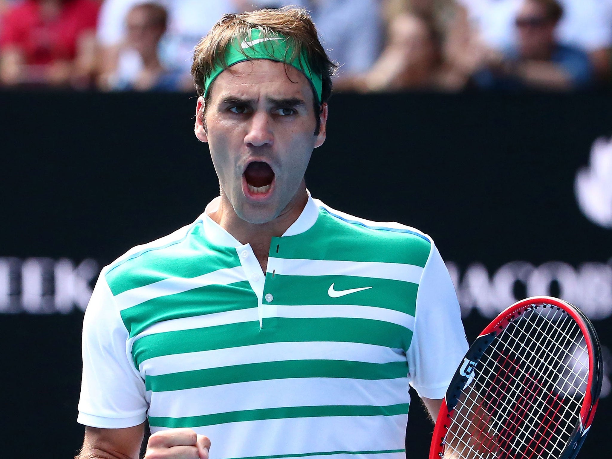Roger Federer celebrates his quarter-final victory over Tomas Berdych