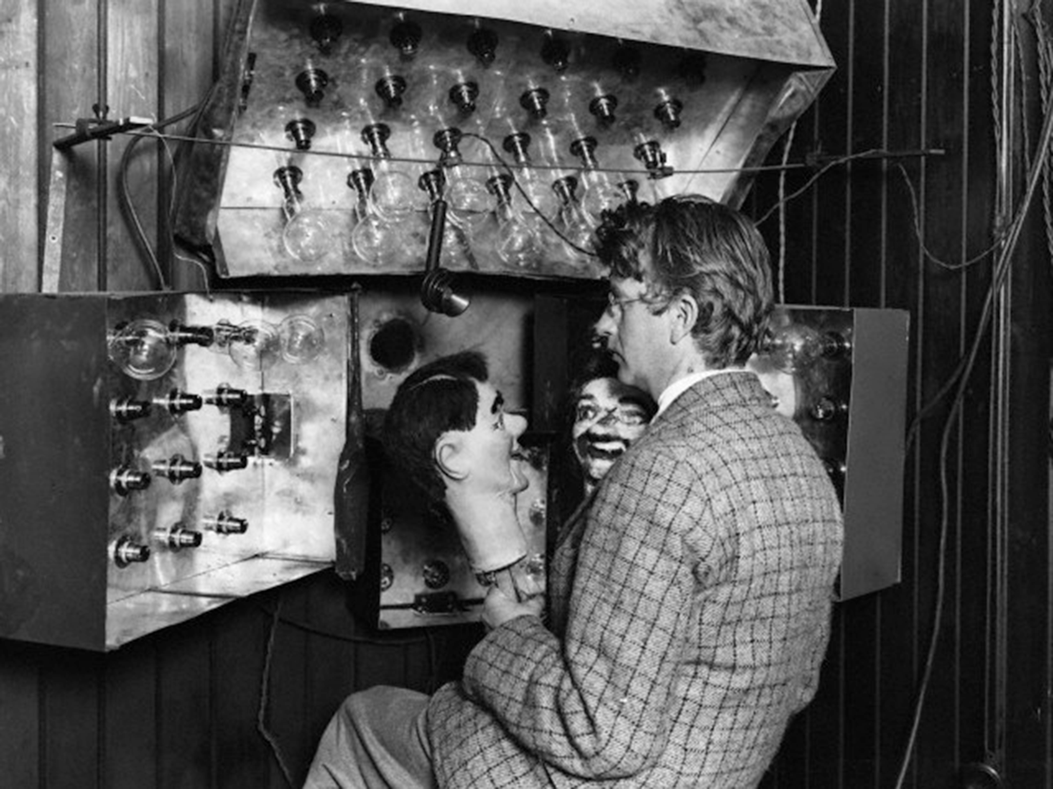 John Logie Baird demonstrates his invention in July 1926, first using a dummy known as "Stooky Bill" before finding a real human subject
