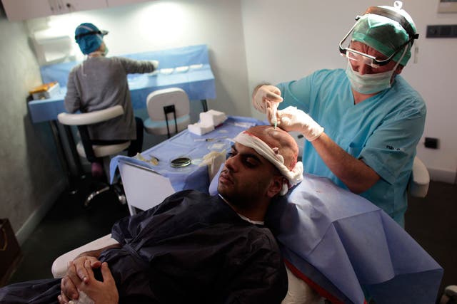 Fahad Ali, a 27-yearold medical tourist from Britain, is prepared for a hair transplant in Istanbul
