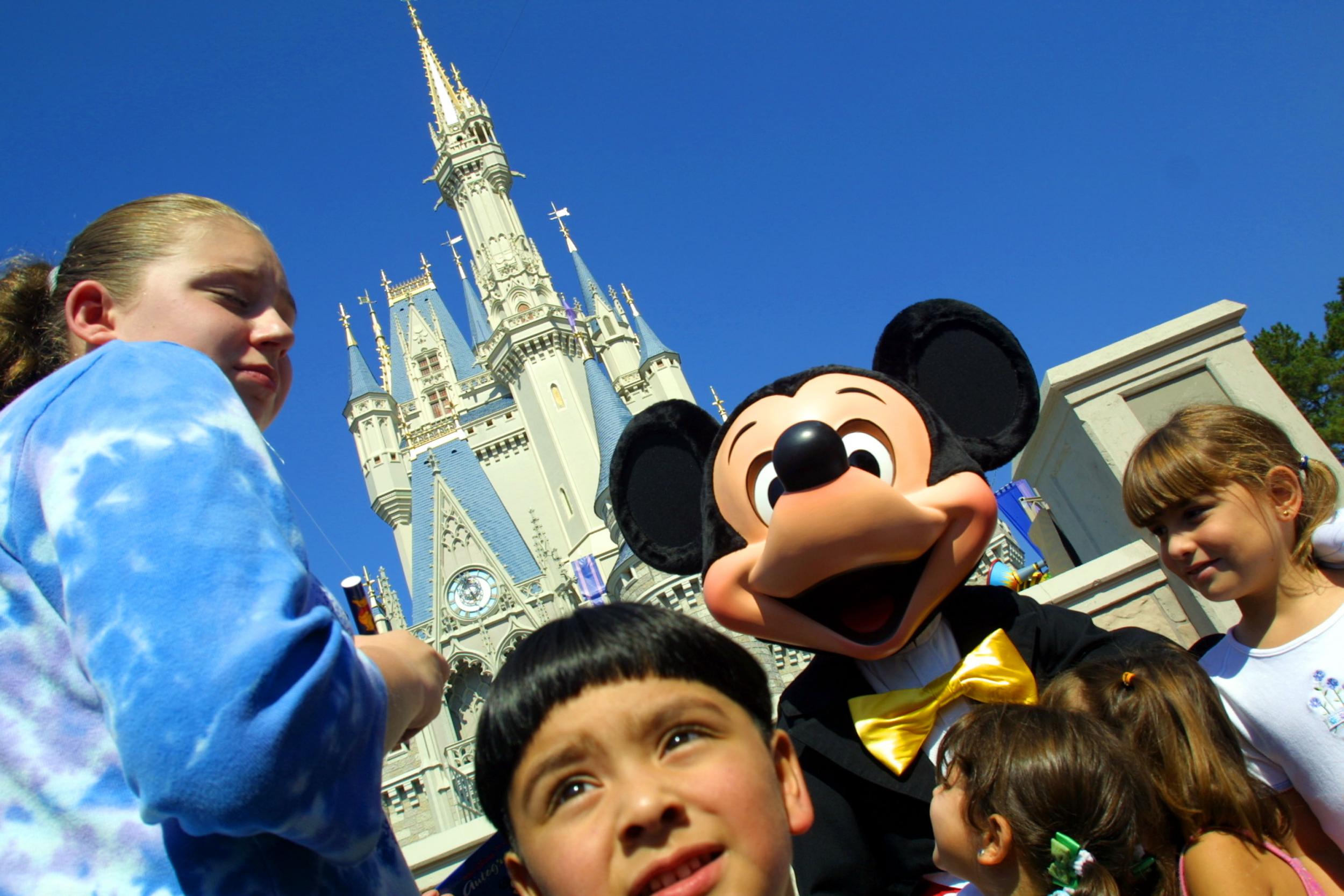 Mickey Mouse hangs with children in Orlando, Florida.