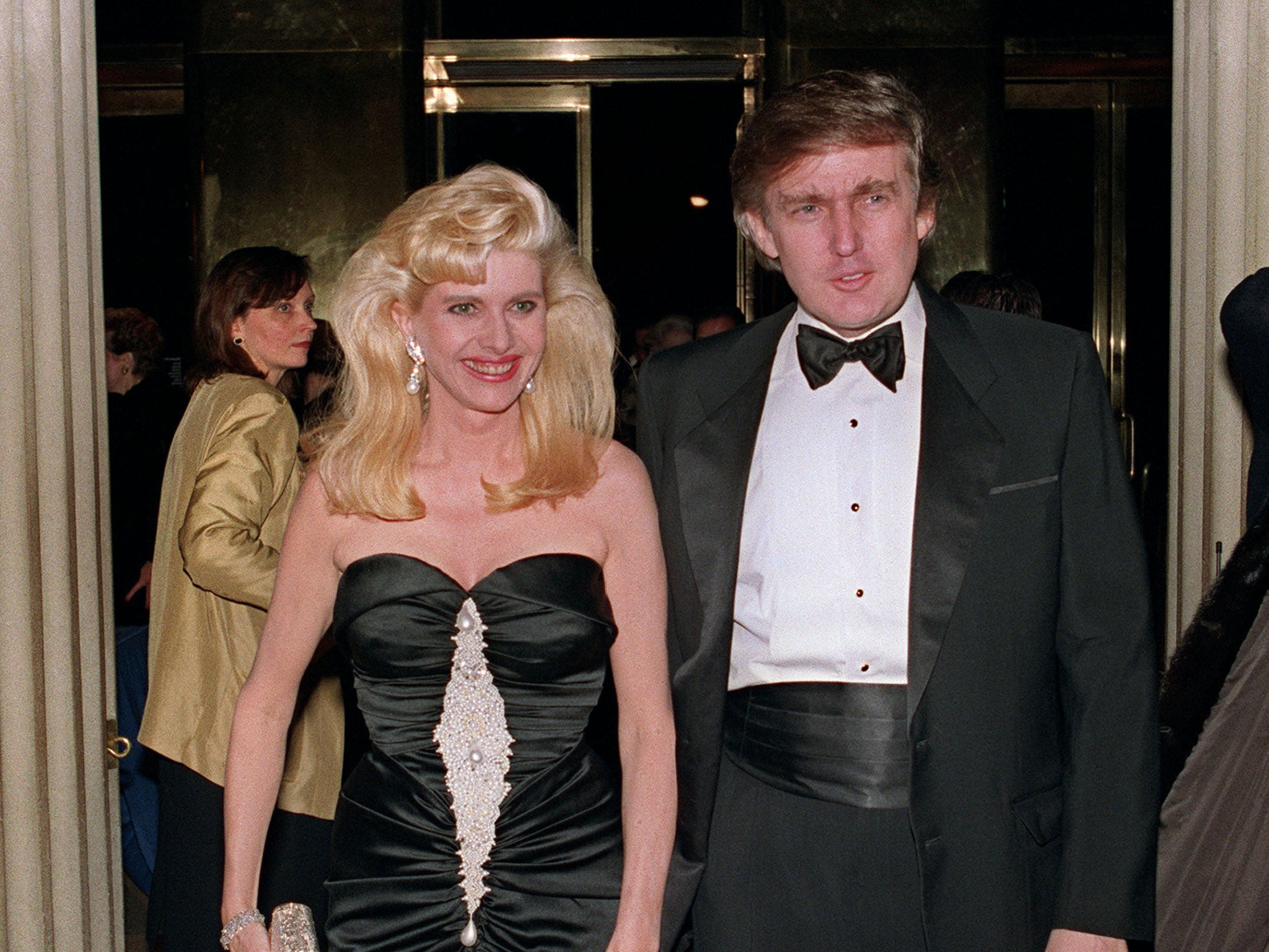 Donald Trump and his wife Ivana arrive at a social engagement in New York, 4 December, 1989