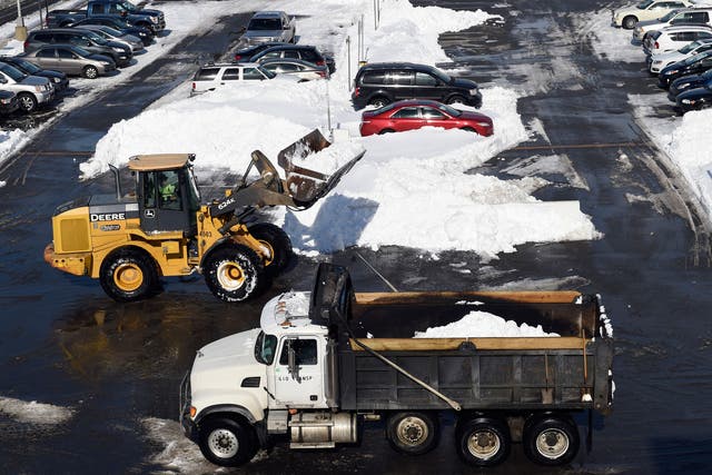 The death struggle for post-blizzard parking is playing out in different ways along the East Coast