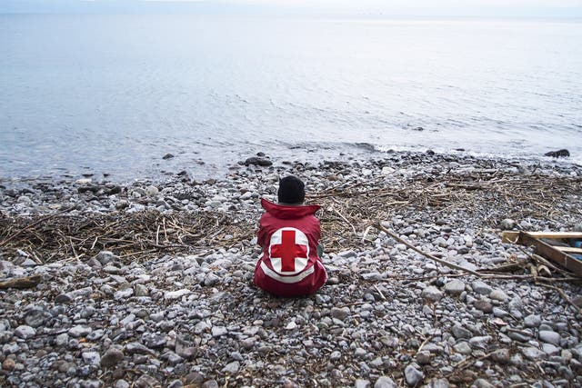 A member of the Greek Red Cross awaiting more refugee arrivals on the island of Lesbos this week
