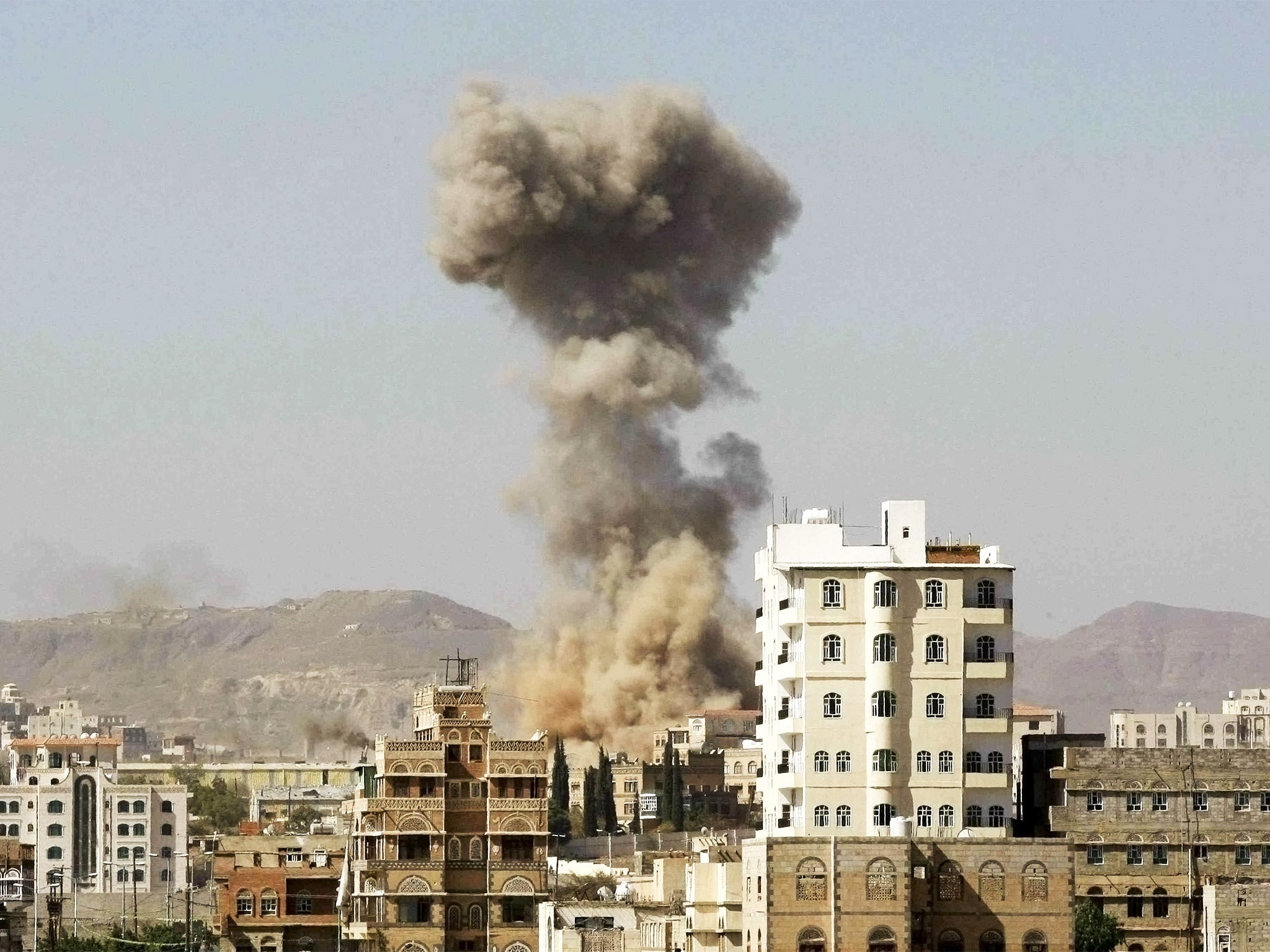 Smoke rises after a Saudi-led airstrike hits an army base in Sanaa, Yemen.