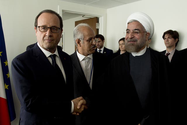 Hollande and Rouhani were supposed to meet for lunch at an upmarket restaurant in Paris