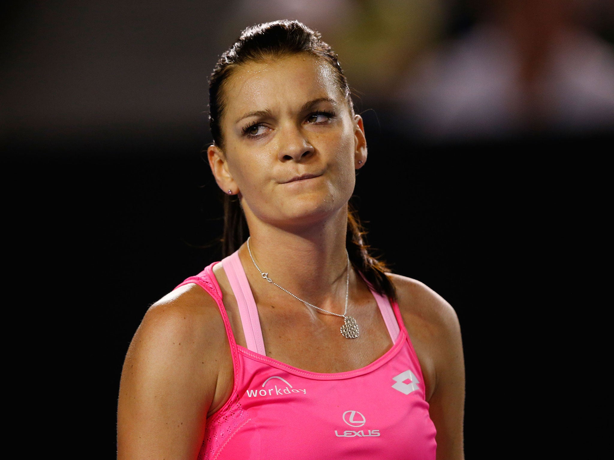 Agnieszka Radwanska reacts to her Australian Open semi-final defeat by Serena Williams