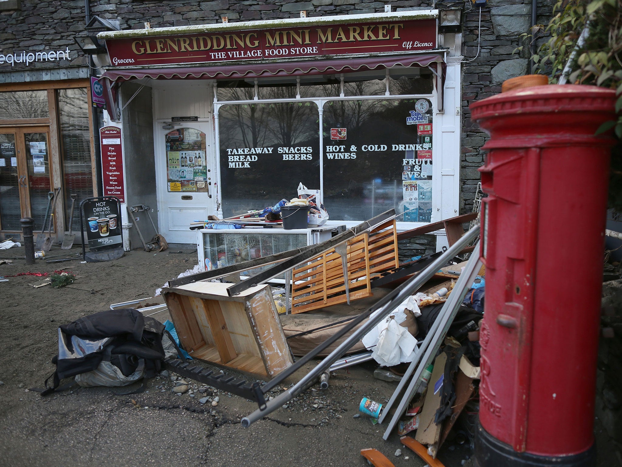 The scene of devastation in the Cumbrian village of Glenridding after the beck broke it's banks in December