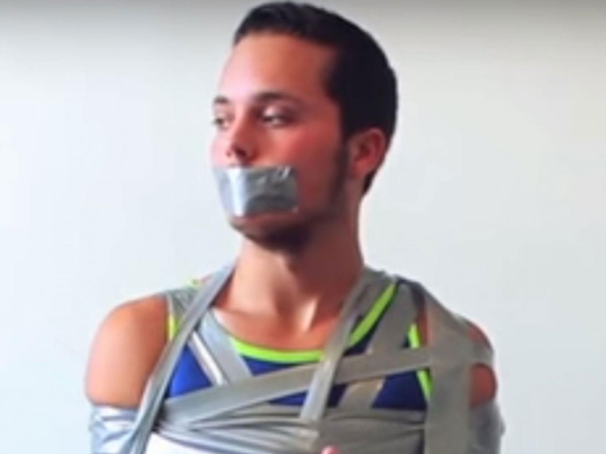 A man is filmed taking part in the ‘duct tape challenge'
