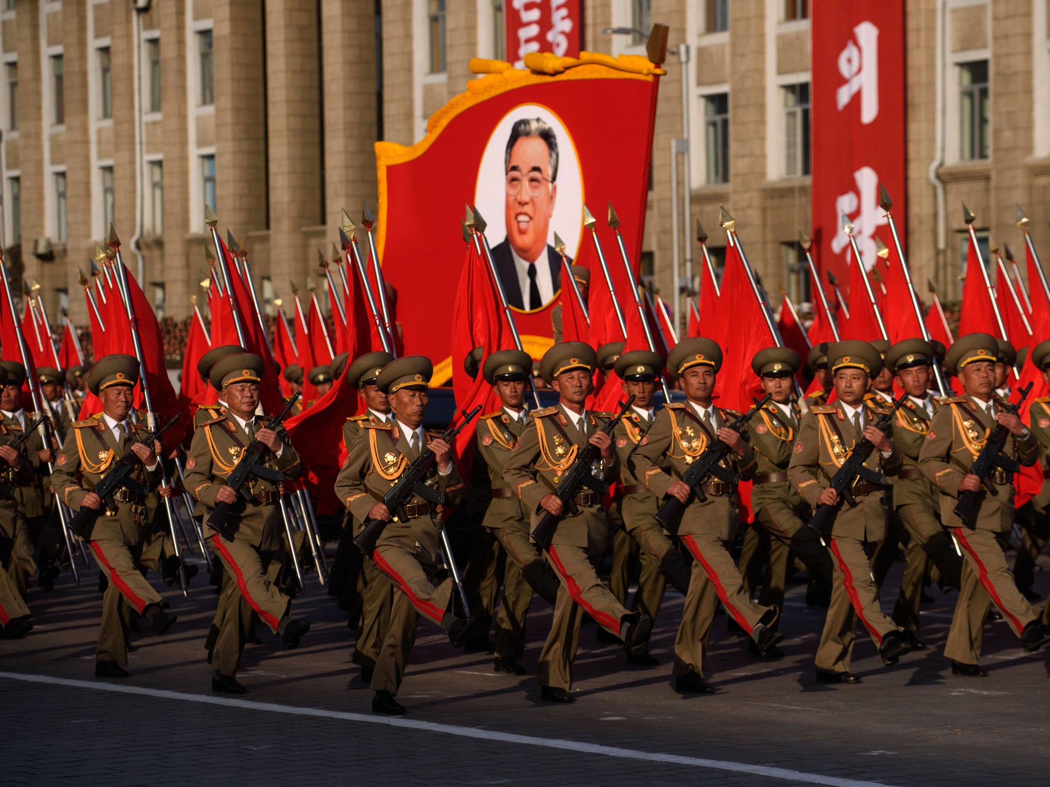 Diplomatic fallout: North Korean soldiers march past a portrait of the late Kim Il-sung in Pyongyang in 2015