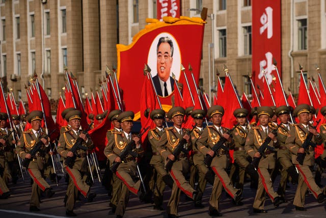 Diplomatic fallout: North Korean soldiers march past a portrait of the late Kim Il-sung in Pyongyang in 2015