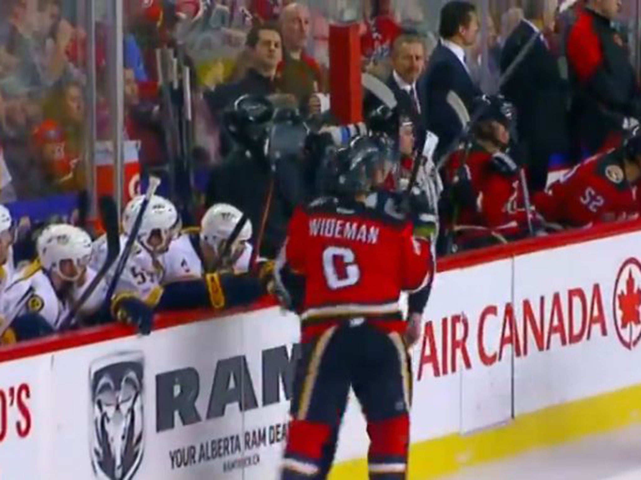 Wideman appears to intentionally check Henderson from behind