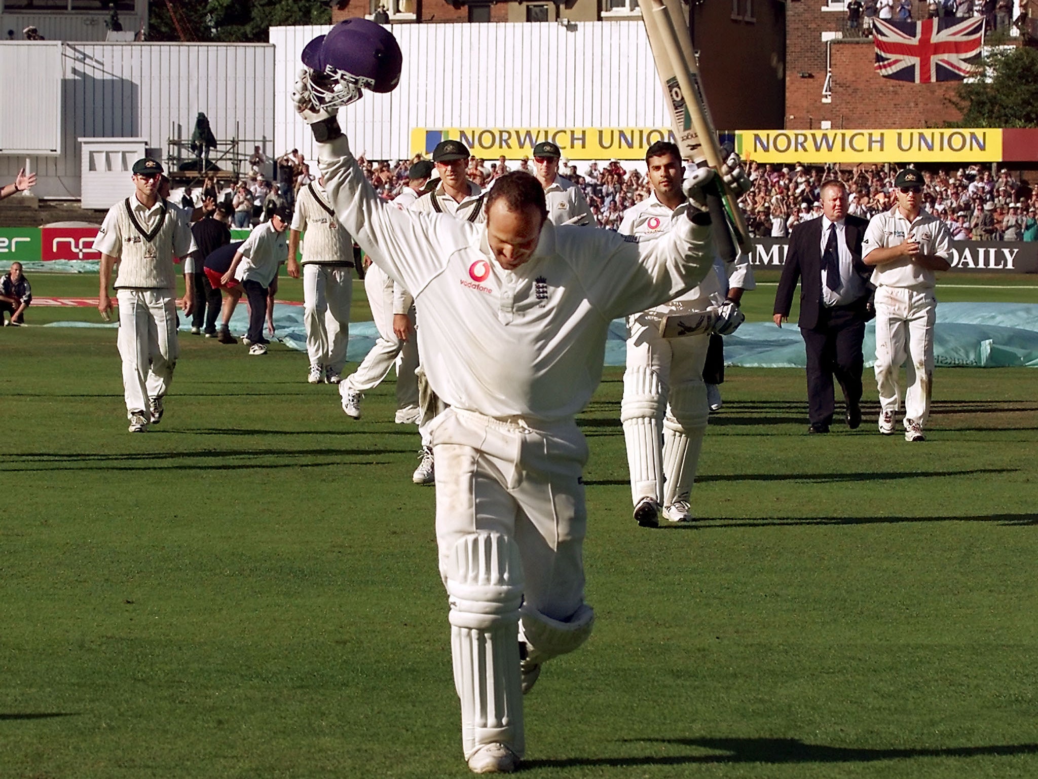 England batsman Mark Butcher runs from the field after steering England to victory over Australia with an innings of 173 not out on the final day of the fourth Test in 2001