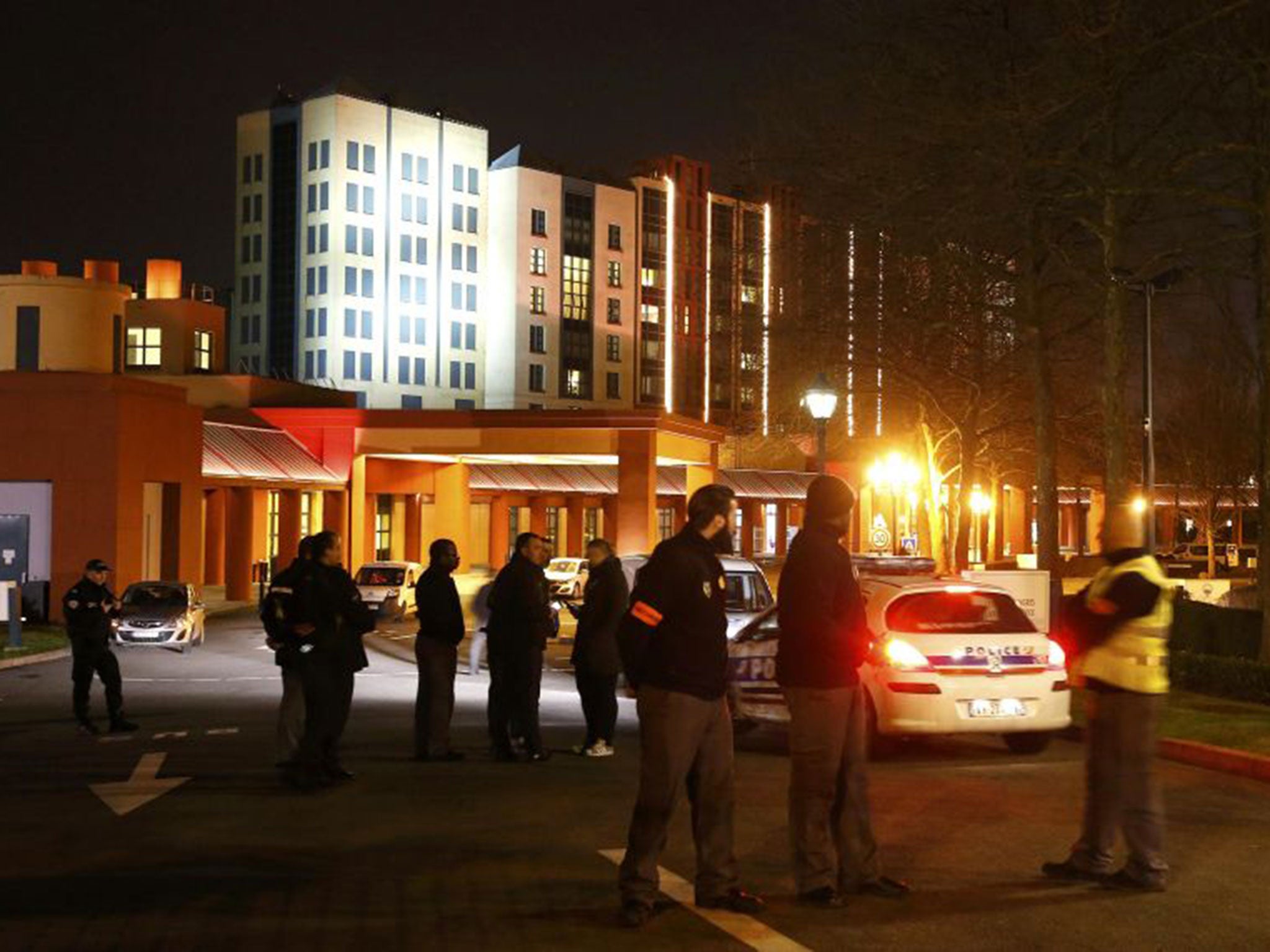 French police officers secure the New York hotel, located at the entrance of Disneyland Paris