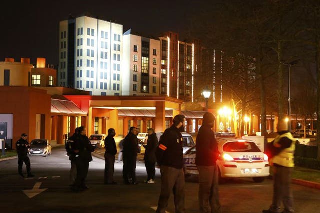 French police officers secure the New York hotel, located at the entrance of Disneyland Paris