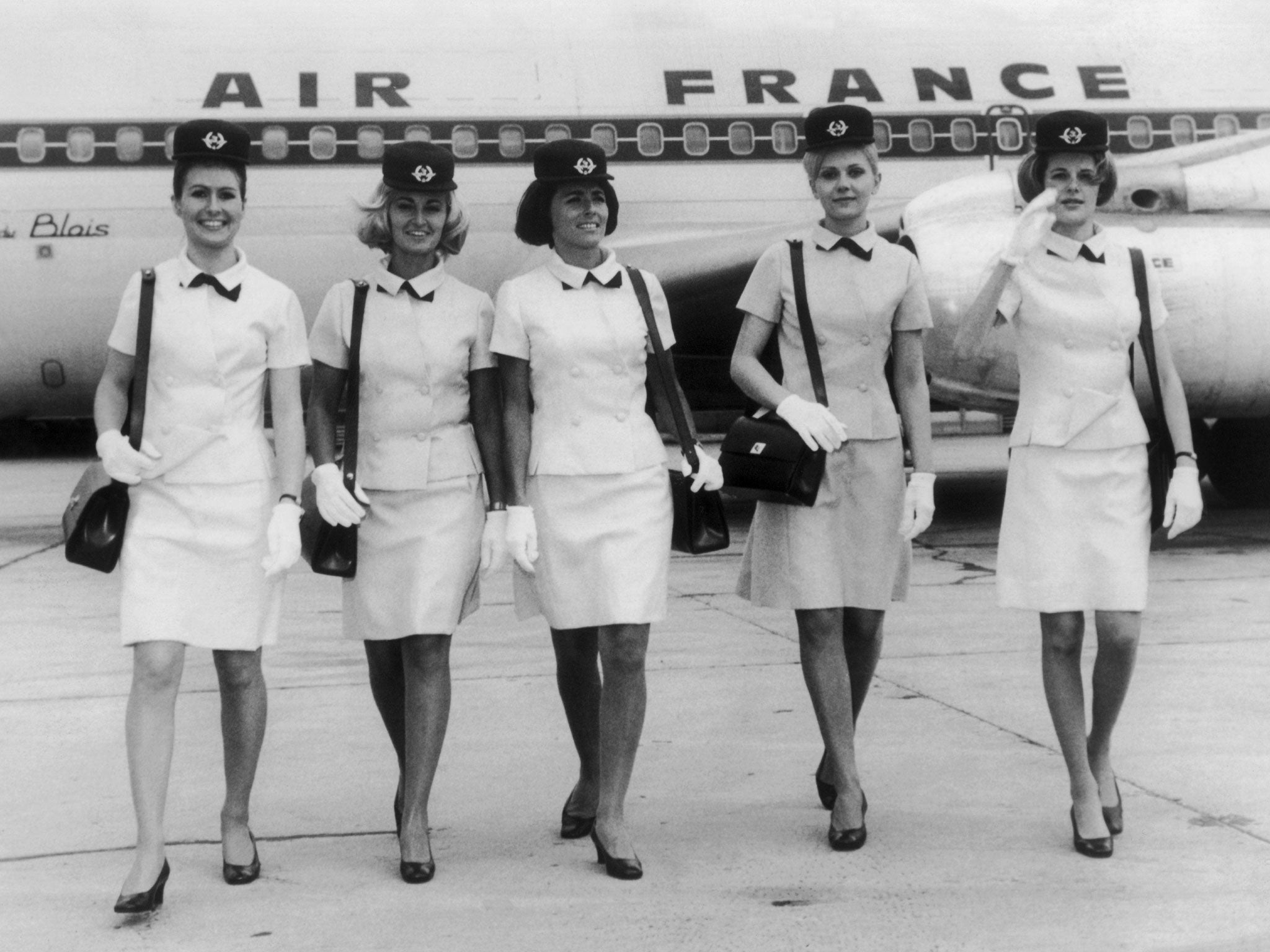 Air France stewardesses wear the new Cristóbal Balenciaga-designed uniforms in Paris in 1969
