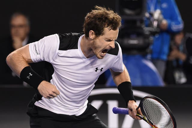 Andy Murray celebrates breaking Milos Raonic in the fourth set