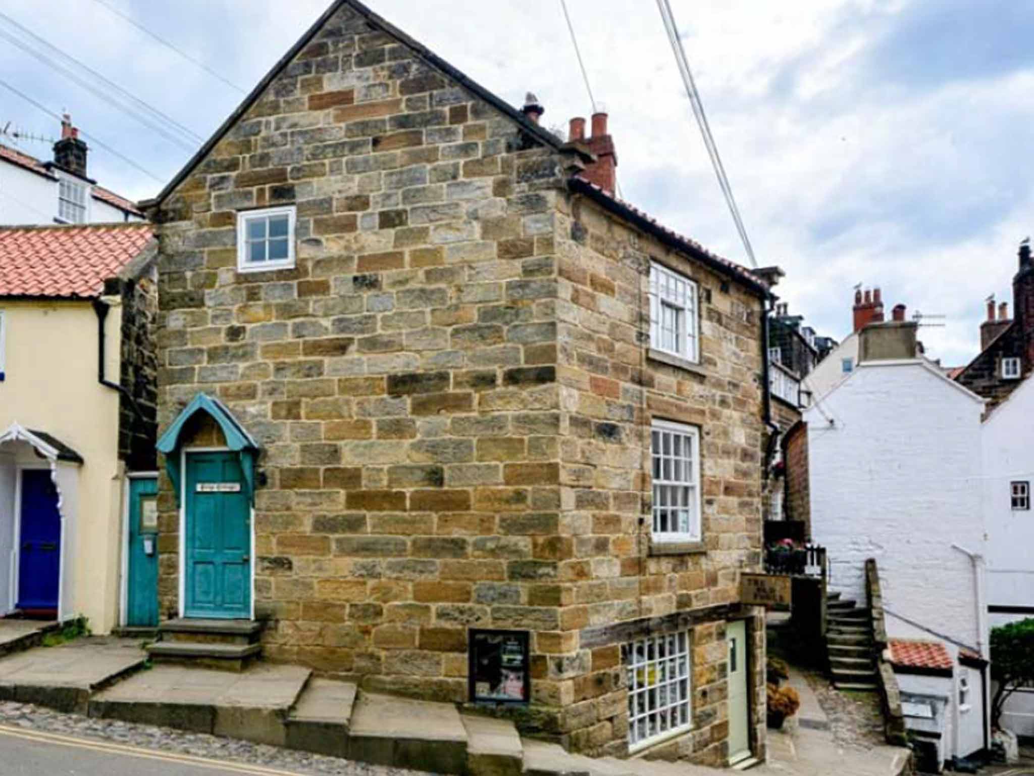 Currently in use as a holiday let, this attractive one bedroom cottage in Robin Hood’s Bay, Whitby, Yorkshire, was originally a blacksmith’s forge. It is on the market for £187,000 (including all contents, beds, washing machine, etc) with eMoov