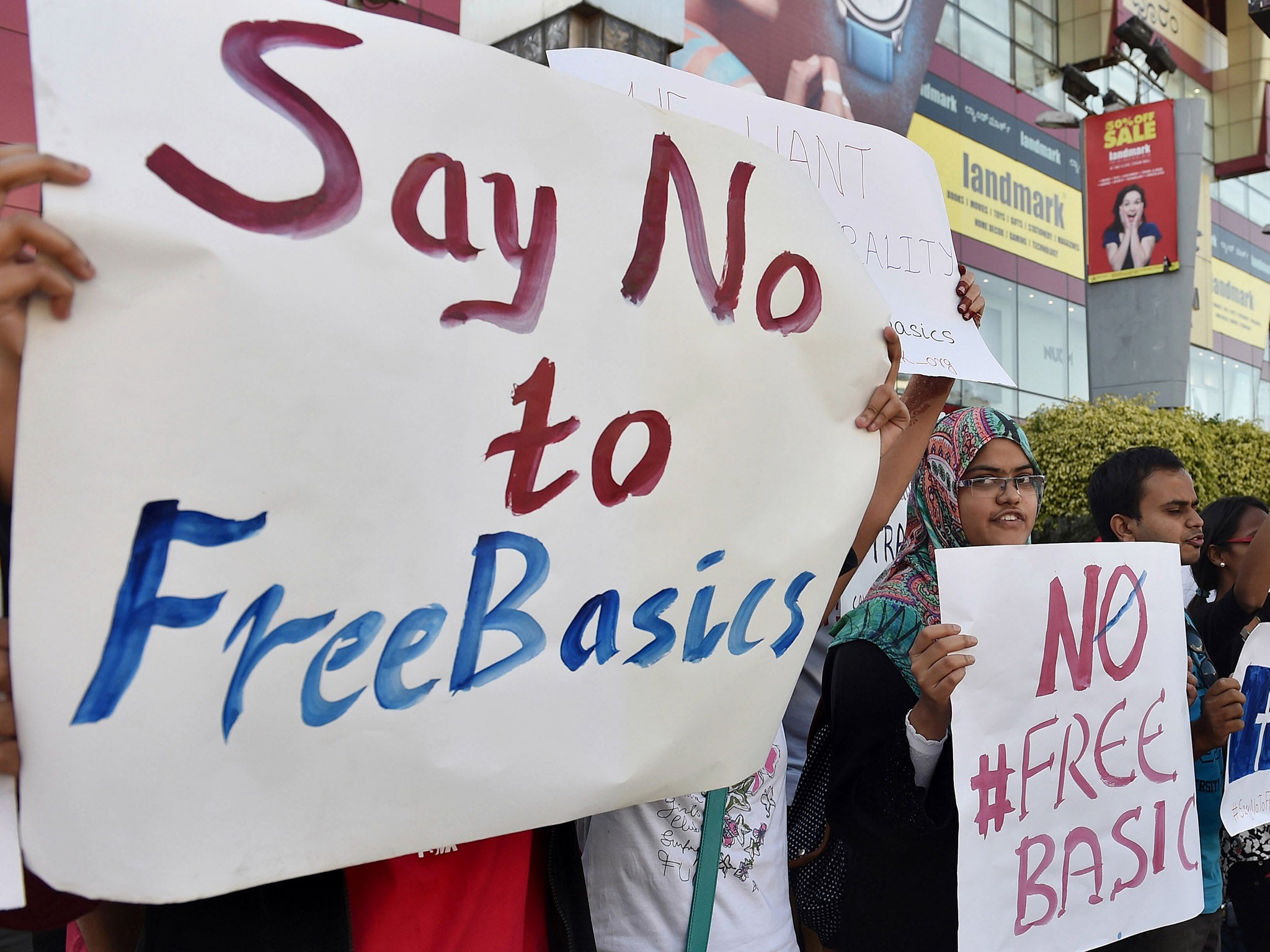 Indian demonstrators of Free Software Movement Karnataka hold placards during a protest against Facebook's Free Basics initiative, in Bangalore.