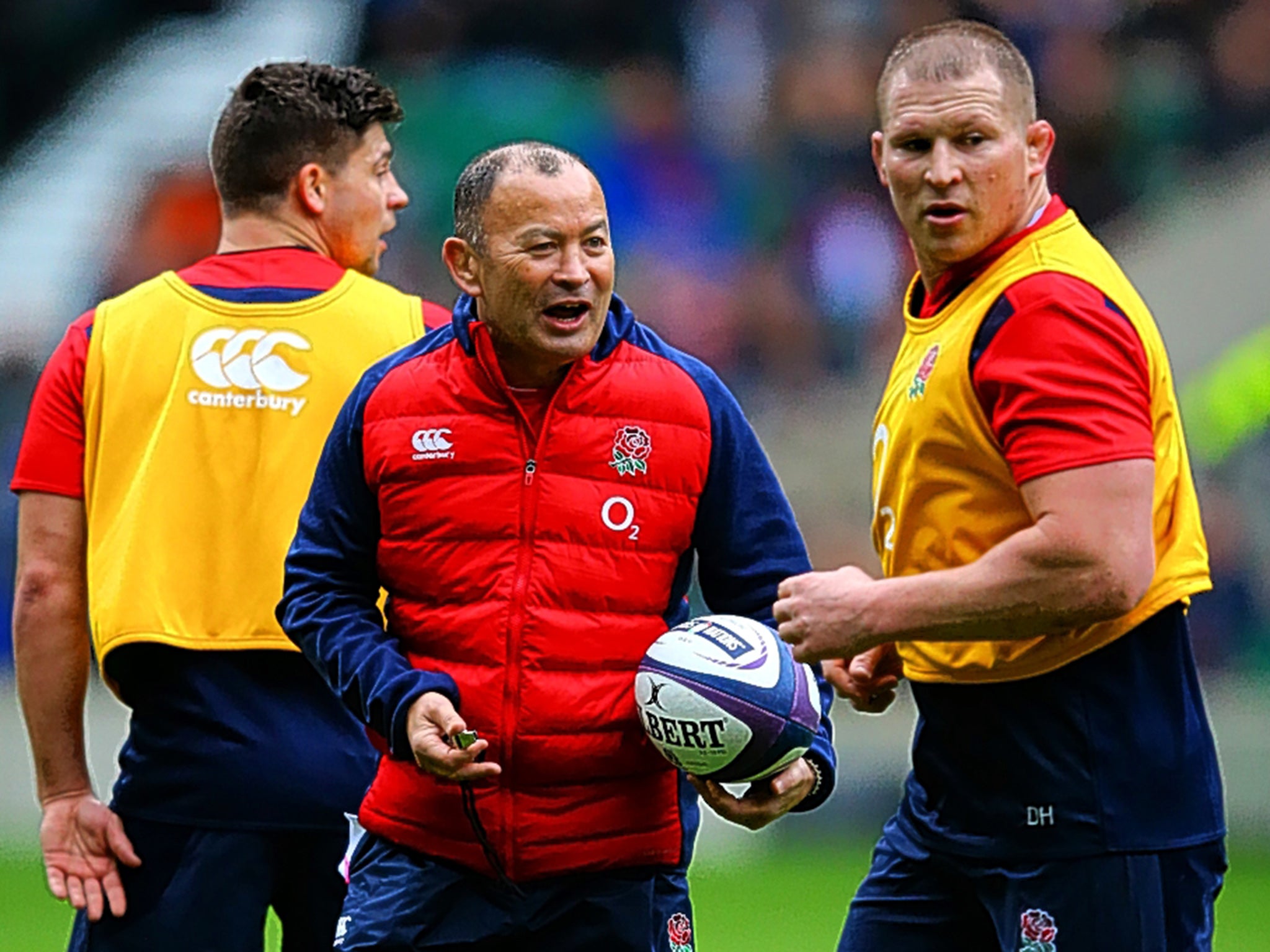 Eddie Jones speaks with the new England captain, Dylan Hartley, during a training session at Twickenham