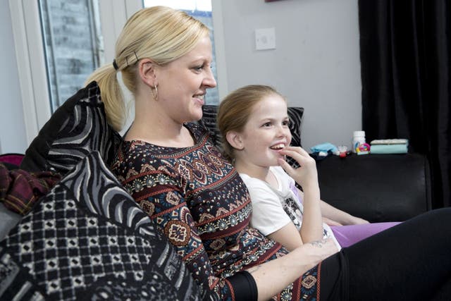 Libby Coughlon, 10, who suffers from cystic fibrosis, receives home support from community nurse Frances Choudray