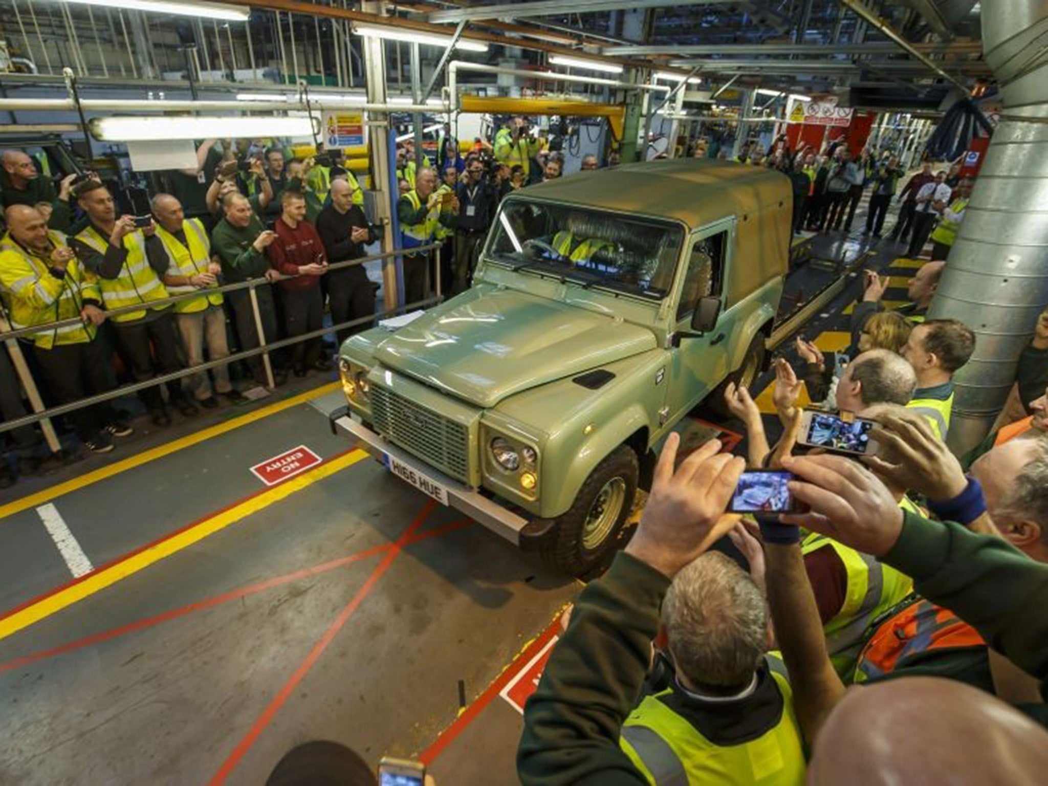The last Land Rover Defender rolls off the production line at Solihull yesterday