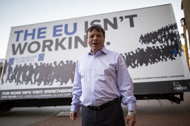 Aaron Banks in front of an ad trailer with 'The EU isn't working' UKIP Conference, Doncaster, Britain